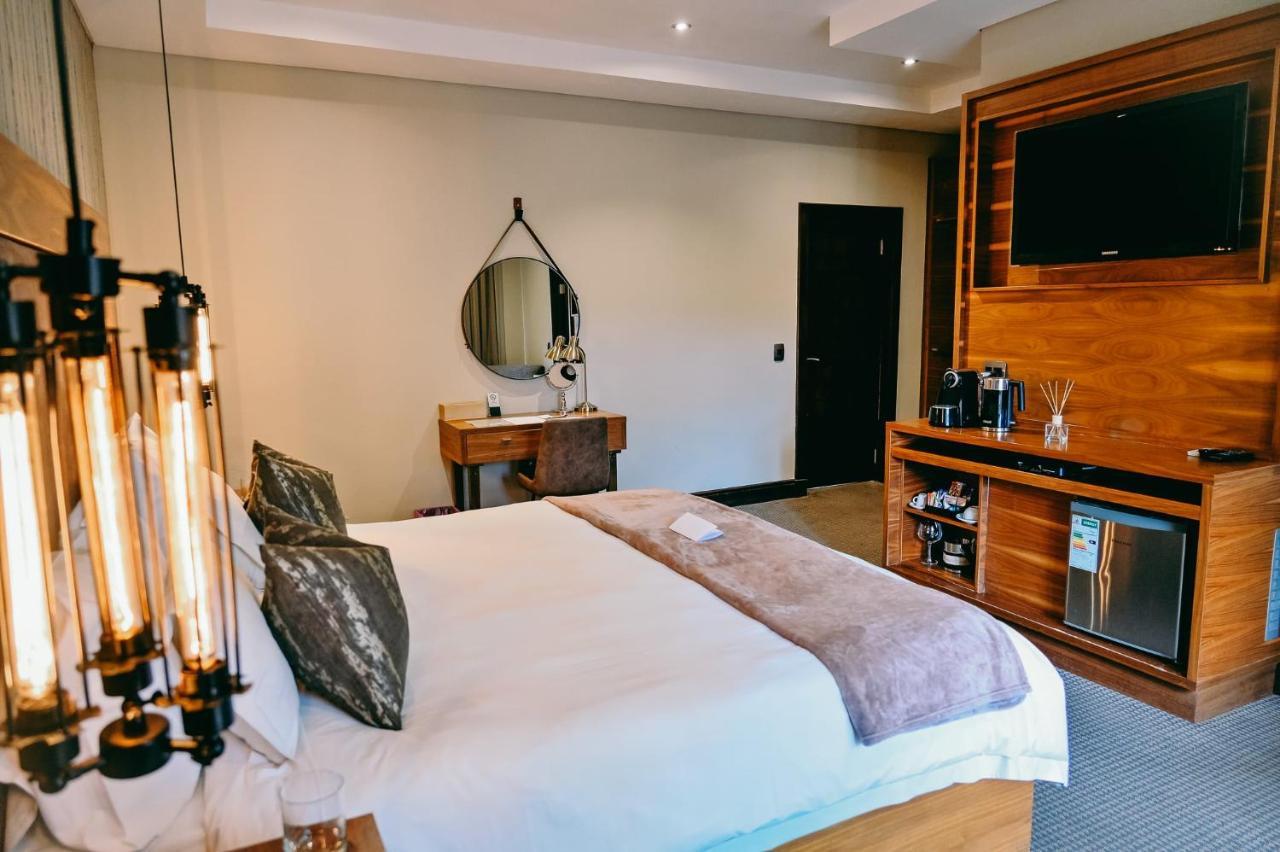 Tredenham Boutique Hotel Блумфонтейн Экстерьер фото A room at the hotel