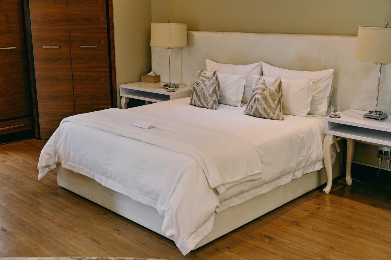 Tredenham Boutique Hotel Блумфонтейн Экстерьер фото A bed