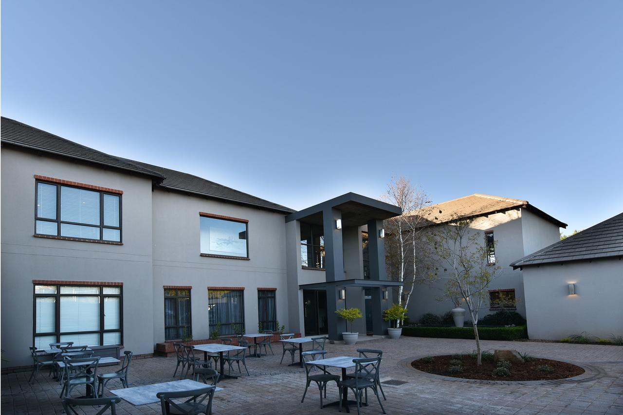 Tredenham Boutique Hotel Блумфонтейн Экстерьер фото The courtyard at the University of Pretoria Faculty of Law